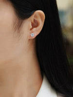 Load image into Gallery viewer, Close-up of an ear wearing Eclat Royal Moissanite Stud Earrings