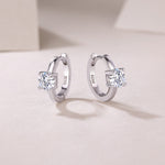 Load image into Gallery viewer, Éclat Solitaire Moissanite Huggie Earrings