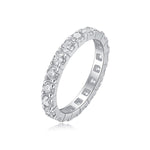 Load image into Gallery viewer, A round-cut moissanite band ring with a platinum band and multiple round-cut moissanite stones set in a continuous circle.