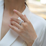 Load image into Gallery viewer, Close-up of a hand wearing a Pavé Royale Moissanite Band