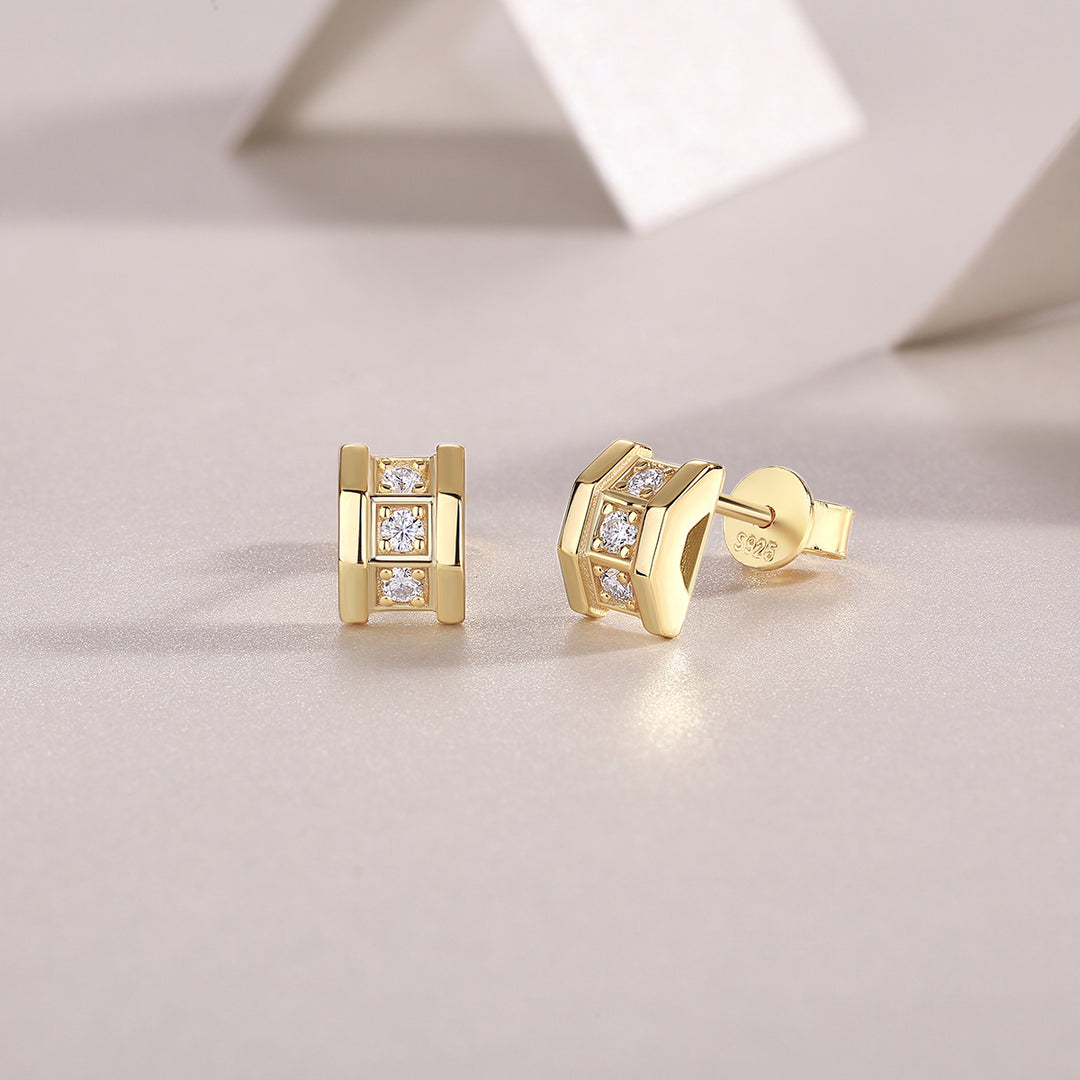 A pair of Aurum Mosaic Stud Earrings featuring geometric silhouette with round-cut moissanite stones set in gold-plated sterling silver.