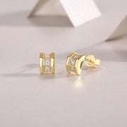 A pair of Aurum Mosaic Stud Earrings featuring geometric silhouette with round-cut moissanite stones set in gold-plated sterling silver.