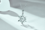 Load image into Gallery viewer, Danse Snowflake Moissanite Necklace on a light background
