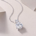 Load image into Gallery viewer, A moissanite silver necklace featuring a dual-stone design with round-cut moissanite stones.
