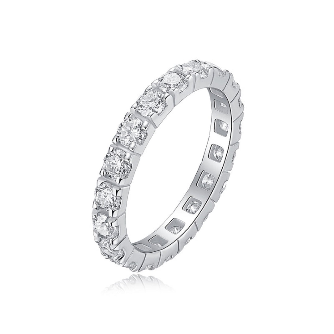 A round-cut moissanite band ring with a platinum band and multiple round-cut moissanite stones set in a continuous circle.