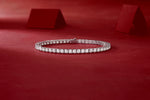 Load image into Gallery viewer, Moissanite tennis bracelet on a red background
