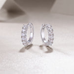 Load image into Gallery viewer, Éternelle Brillance Huggie Moissanite Earrings

