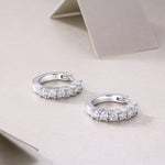 Load image into Gallery viewer, Éternelle Brillance Huggie Moissanite Earrings
