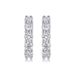 Load image into Gallery viewer, Lumière Éternelle Moissanite Huggie Earrings
