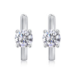 Load image into Gallery viewer, Éclat Solitaire Moissanite Huggie Earrings
