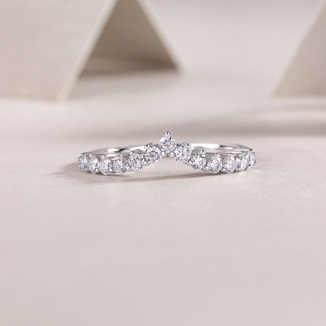 Tiare Princesse Moissanite Ring with round-cut moissanite stones set in a four-prong configuration.
