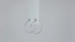 Load and play video in Gallery viewer, Arc d&#39;Éclat Moissanite Hoop Earrings
