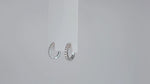 Load and play video in Gallery viewer, Pavé de Lumière Moissanite Hoop Earrings
